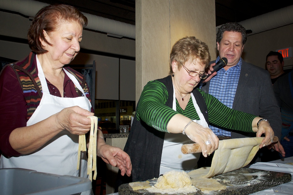 Joe Grande and tow women making pasta